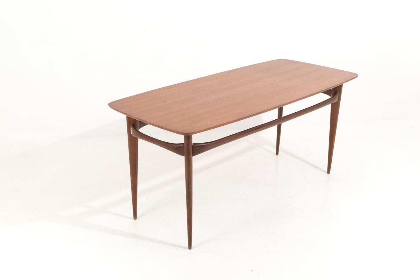 SILVIO CAVATORTA. Walnut table with veneered top, 60s